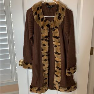 Faux fur trimmed long sweater.